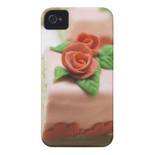 Piece of birthday cake with marzipan roses on iPhone 4 cover