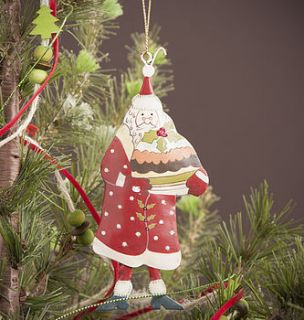 painted tin santa christmas decoration by the contemporary home