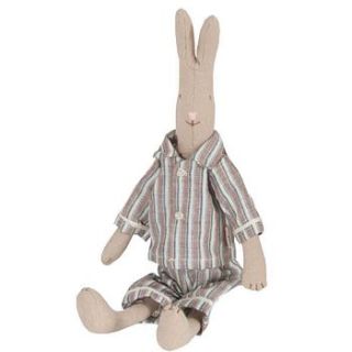 little girl or boy rabbit by the chic country home