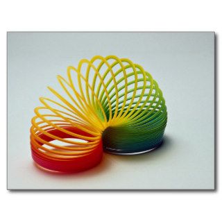 Colorful Rainbow slinky toy for kids Postcards