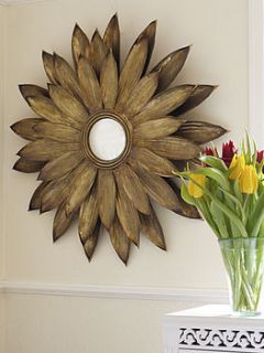 sunflower antiqued gold effect wall mirror by jane trozzo