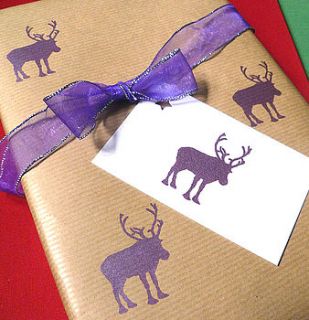 handmade christmas animals wrapping paper by indigoelephant