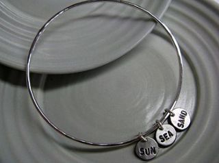 rex's pieces of eight silver bangle by honeybourne jewellery