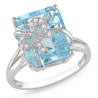 Emerald Cut Blue Topaz and Diamond Accent Bow Ring in Sterling Silver