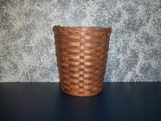 Amish Handmade Round Waste Basket. Measures Approximately 14 1/2" Diameter X 14 1/2" High (Top) and 10 1/4" (Bottom). Accent Your Country Home Decor with a Beautifully Crafted Round Waste Basket. Great for Use in the Office, Bedroom, or Bath