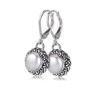 Sterling Silver These sterling silver white mother of pearl earrings by Sara Blaine are versatile enough to compliment your best power suit as well as your sassiest little black dress Dangle Earrings Jewelry