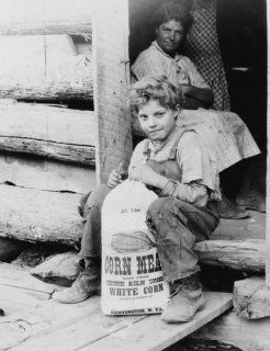 1930 photo Woman and boy with bag of corn meal seated in doorway, Royalton, K a6  