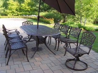 Oakland Living Mississippi Cast Aluminum 82 x 42 in. Oval Patio Dining Set with Swivel Chairs & Tilting Umbrella with Stand   Seats 8   Patio Dining Sets