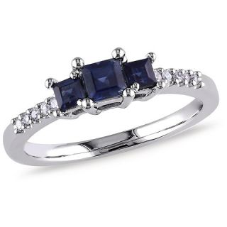 CT. T.W. Sapphire and 0.05 CT. T.W. Diamond Three Stone Ring in
