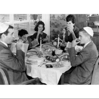 Jewish family taking Seder dinner during Passover festival Poster Print (18 x 24)